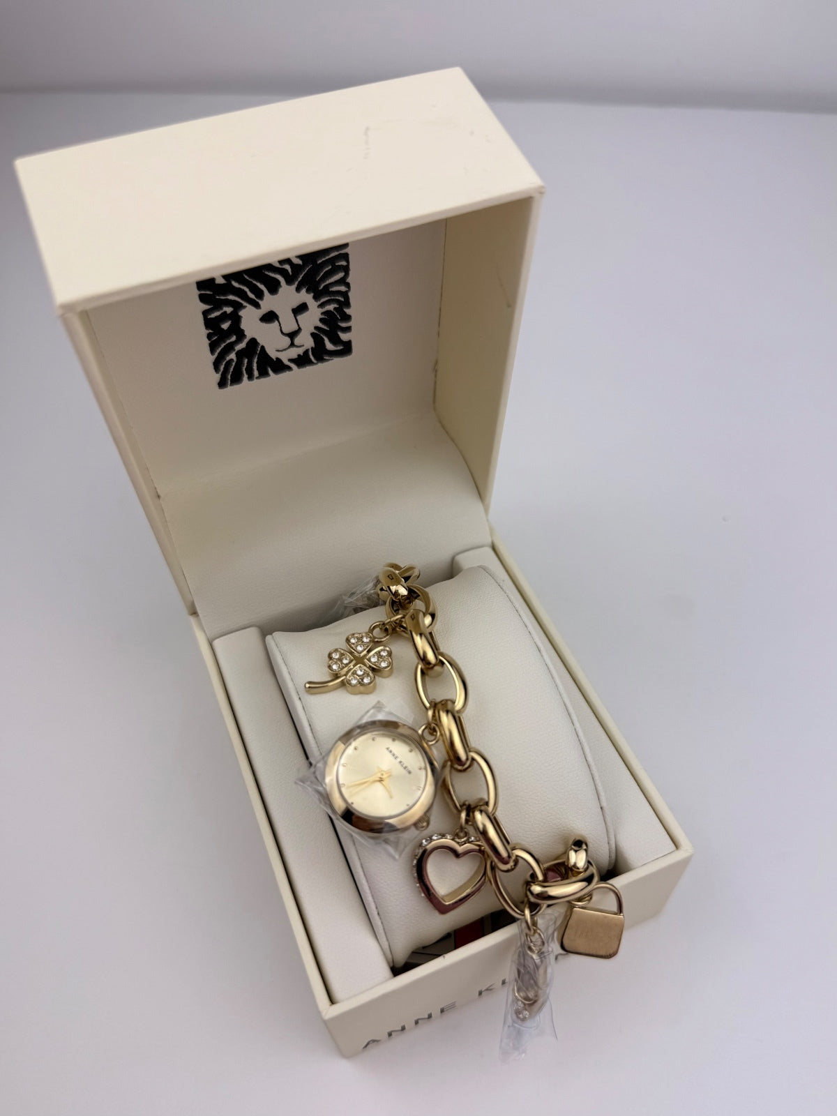Anne Klein Gold Crystal Multi-Charm Bracelet Watch Heart Clover Key Heel NWT