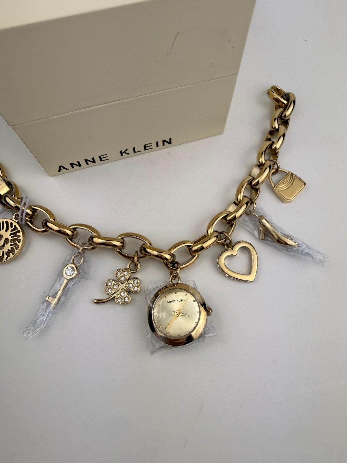 Anne Klein Gold Crystal Multi-Charm Bracelet Watch Heart Clover Key Heel NWT