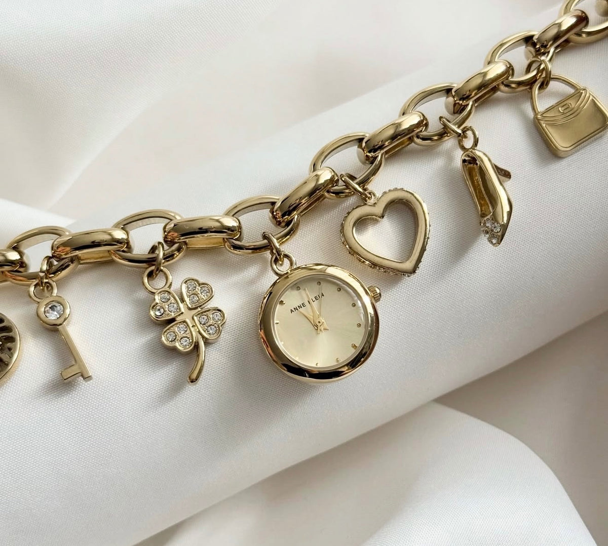 Anne Klein Gold Crystal Multi-Charm Bracelet Watch Heart Clover Key Heel NWT