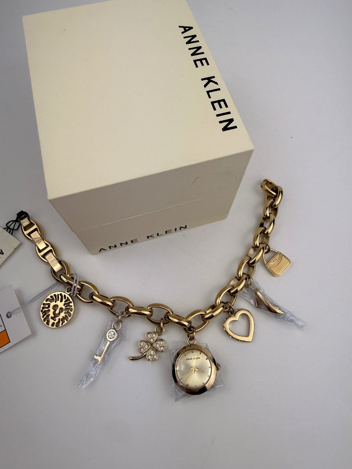 Anne Klein Gold Crystal Multi-Charm Bracelet Watch Heart Clover Key Heel NWT